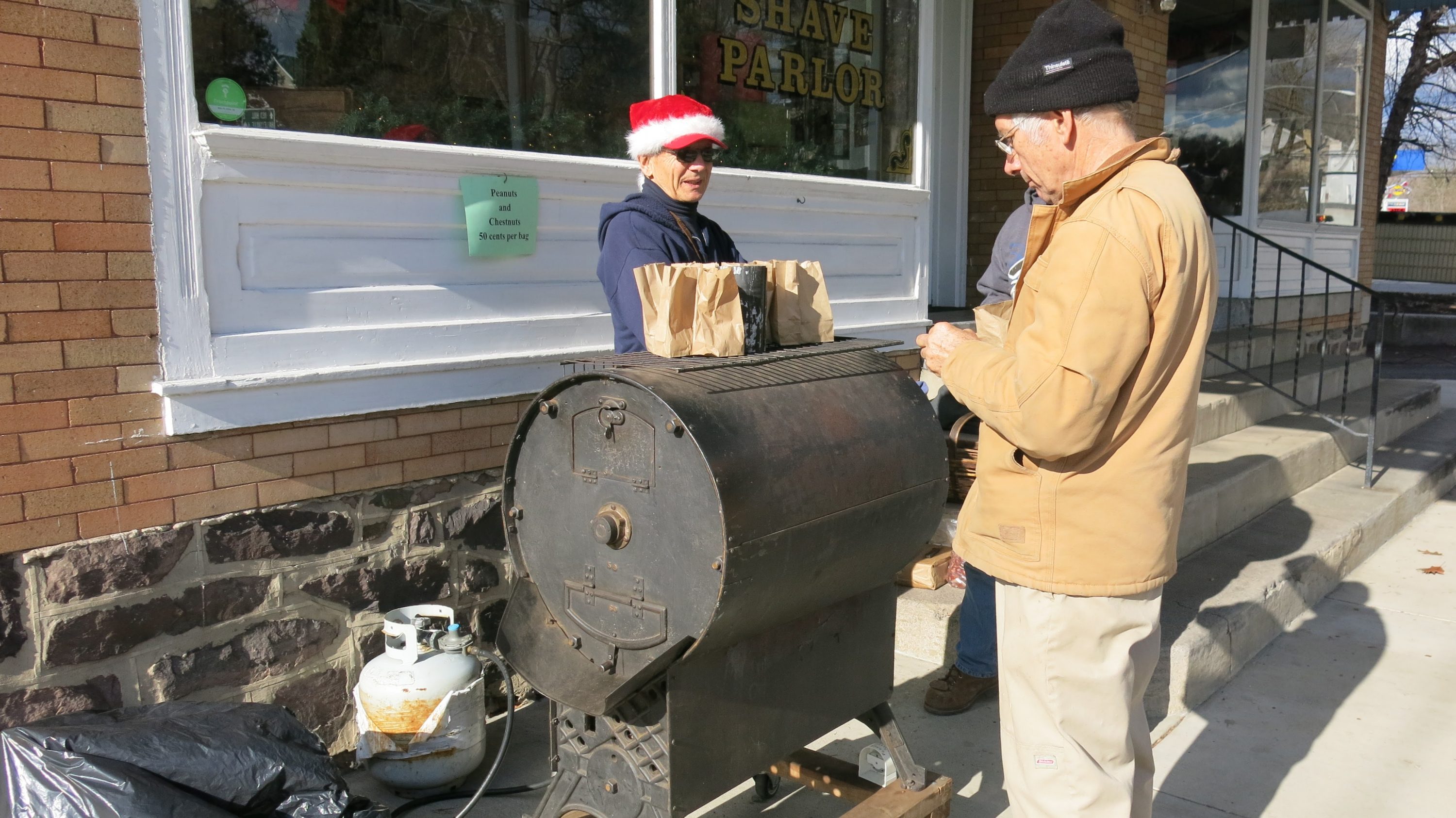 Freshly roasted Peanuts and Chestnuts in front of Red Men's Hall in Green Lane, Pennsylvania. The smell is wonderful, and they taste even better !!!